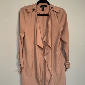Light pink/ Jude colored trench coat.